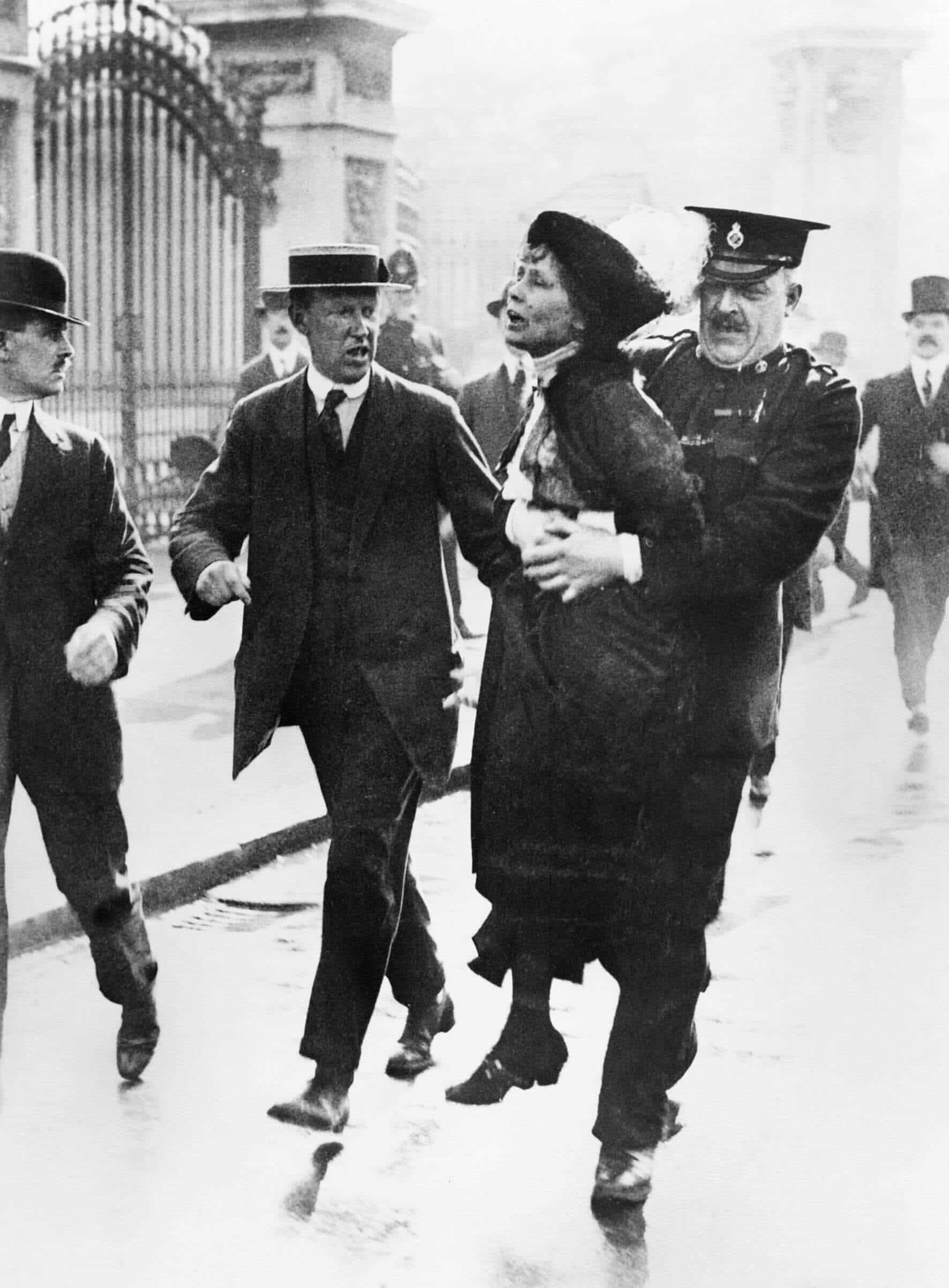 Emmeline Pankhurst, suffragette, carried away by police