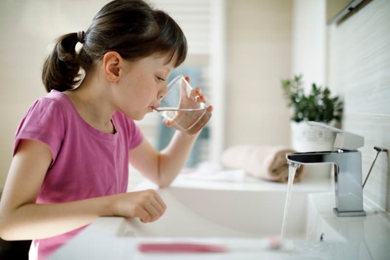 Child drinking tap water