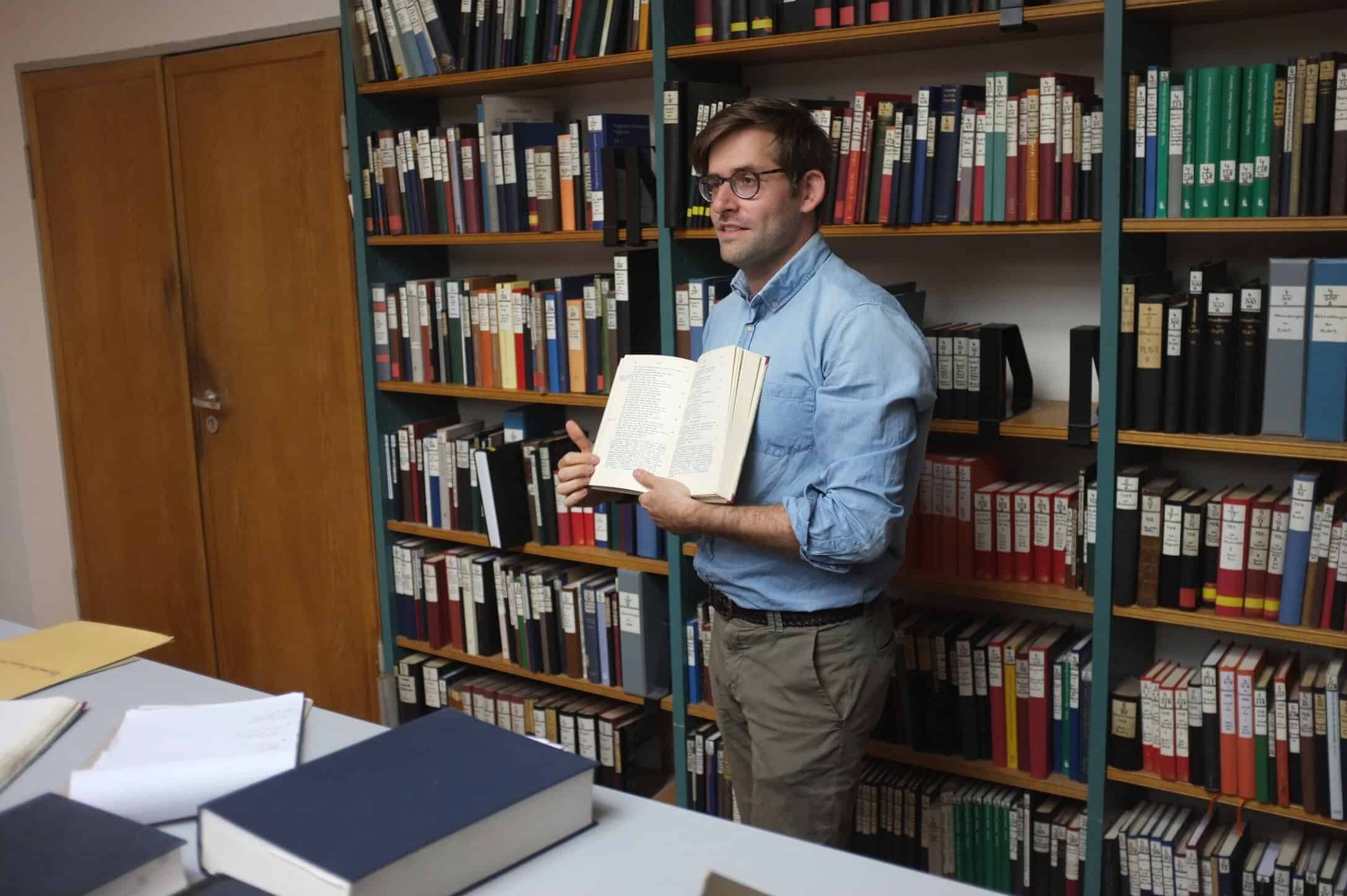 Adam Gitner in the library